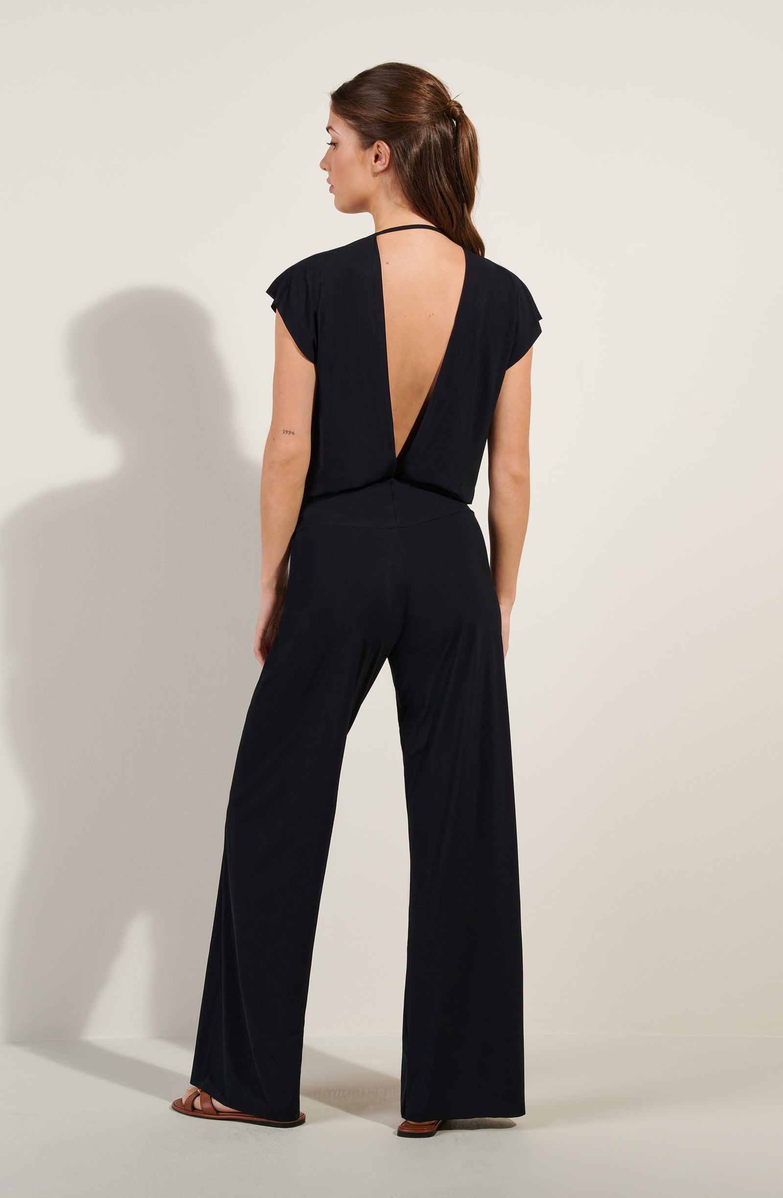 codou black open back jumpsuit
