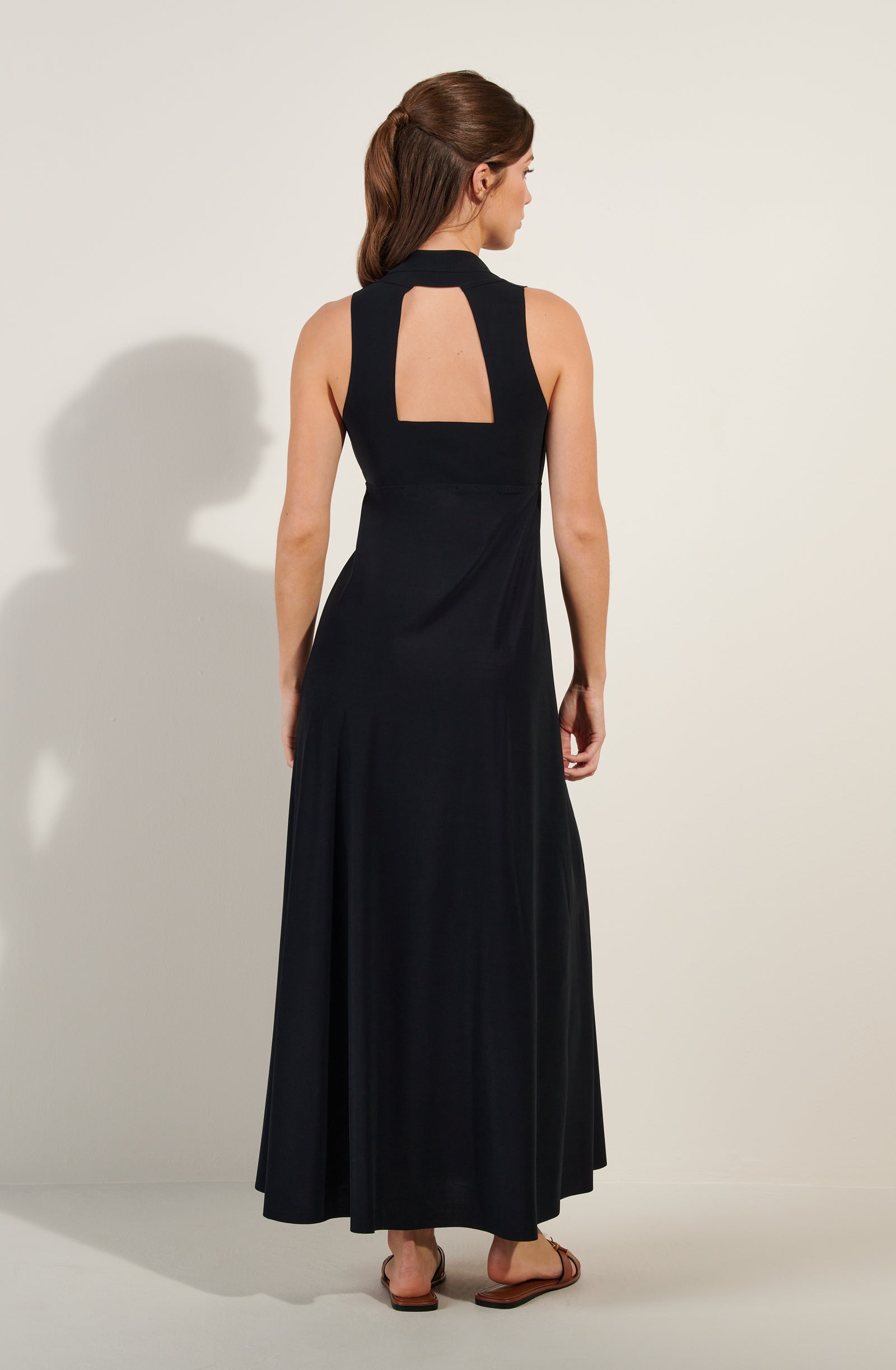 rova long black open back dress
