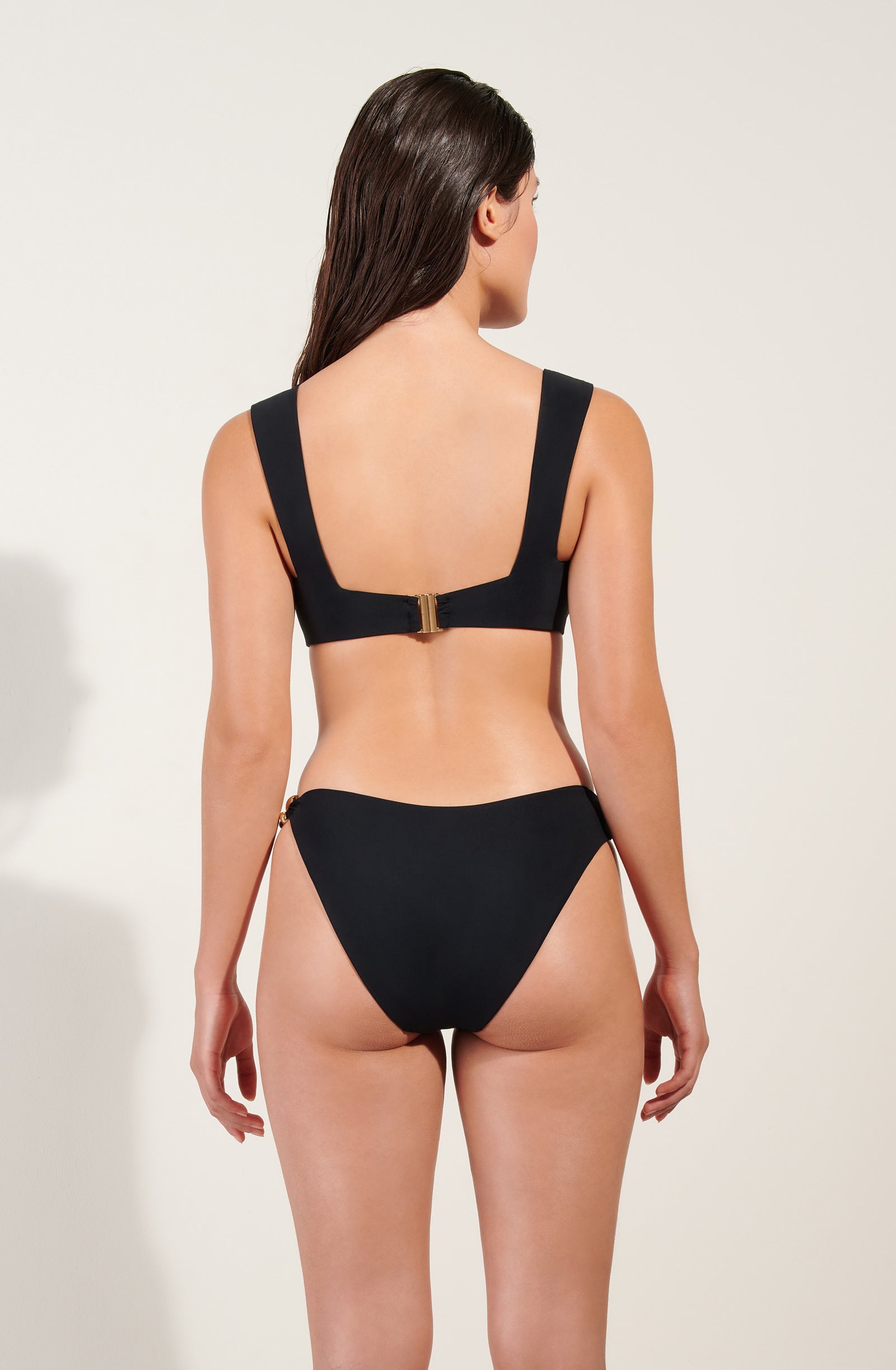 dani Bas de maillot de bain noir à bijou doré
