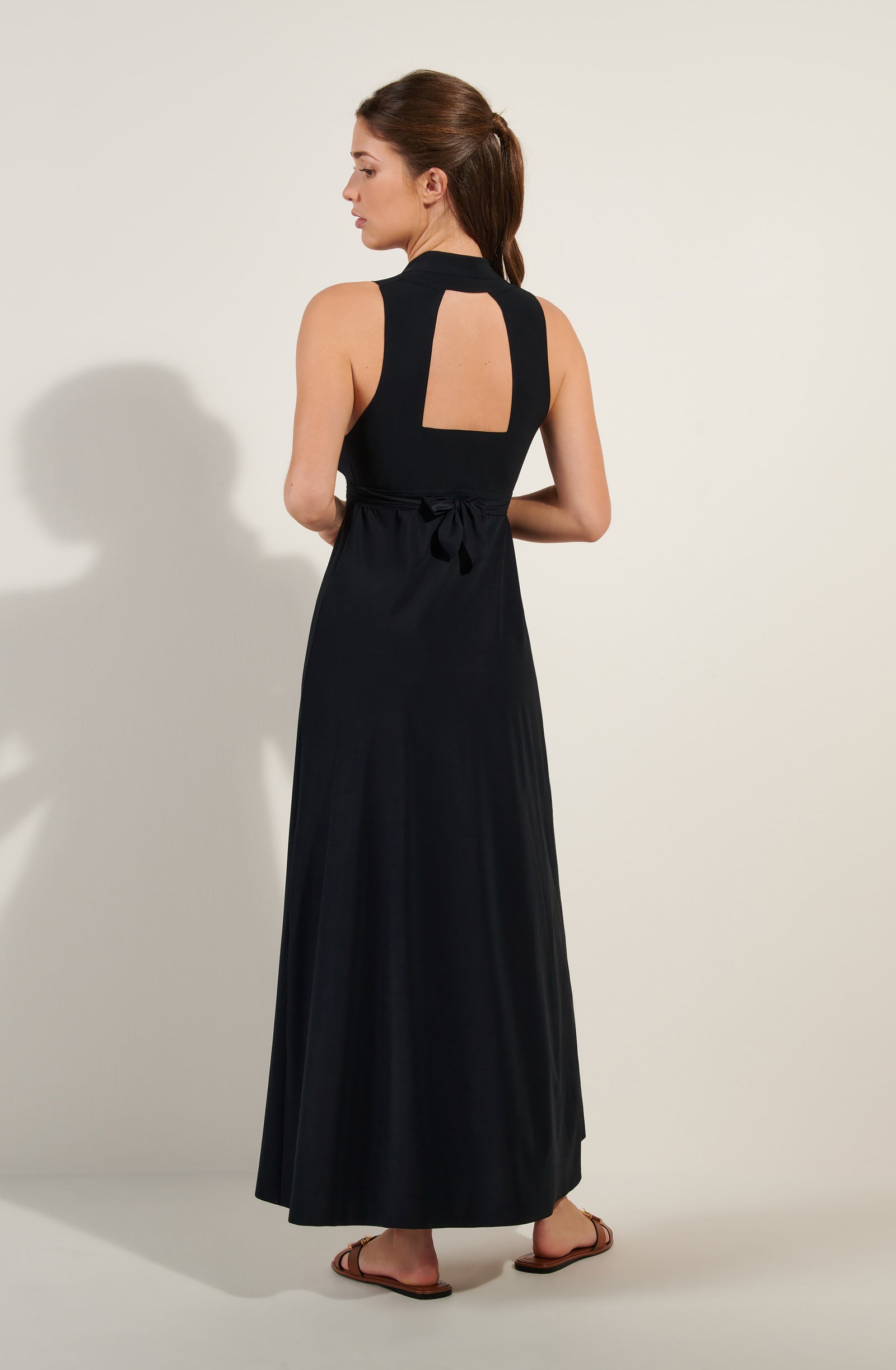 rova long black open back dress