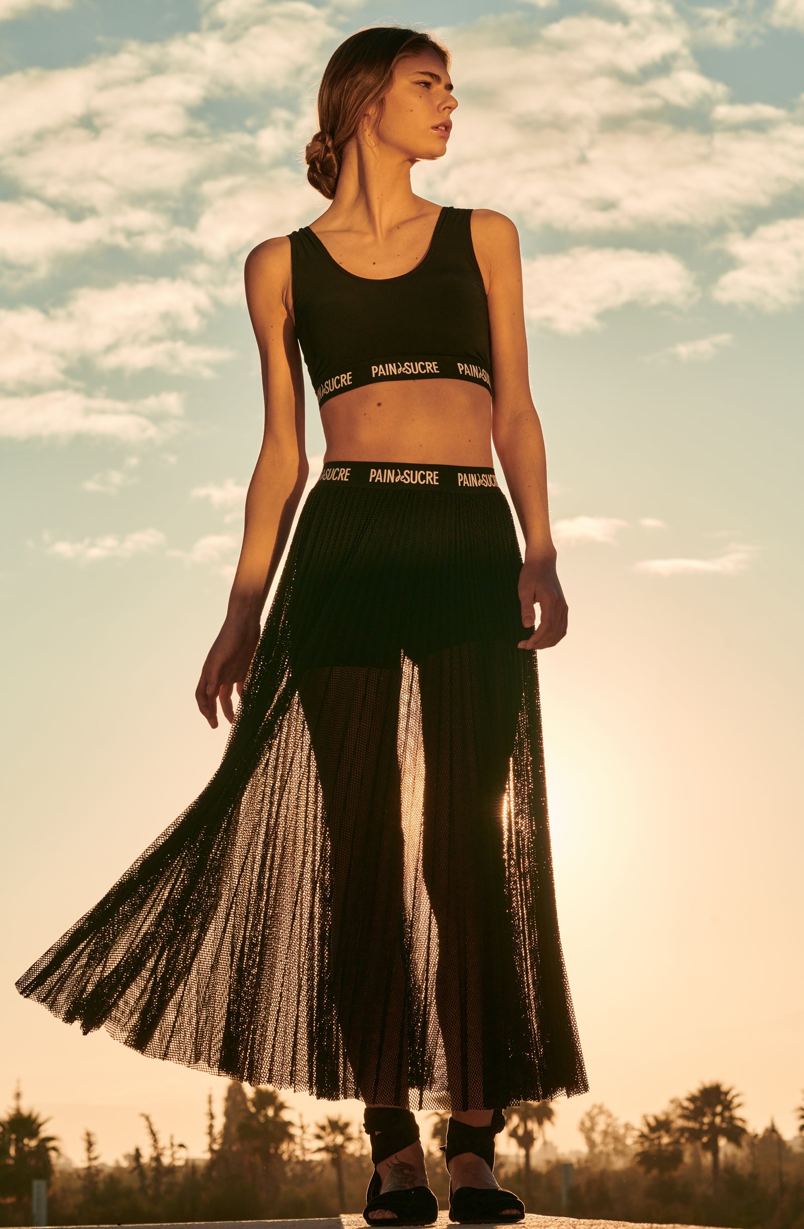 jann
Black pleated maxi skirt